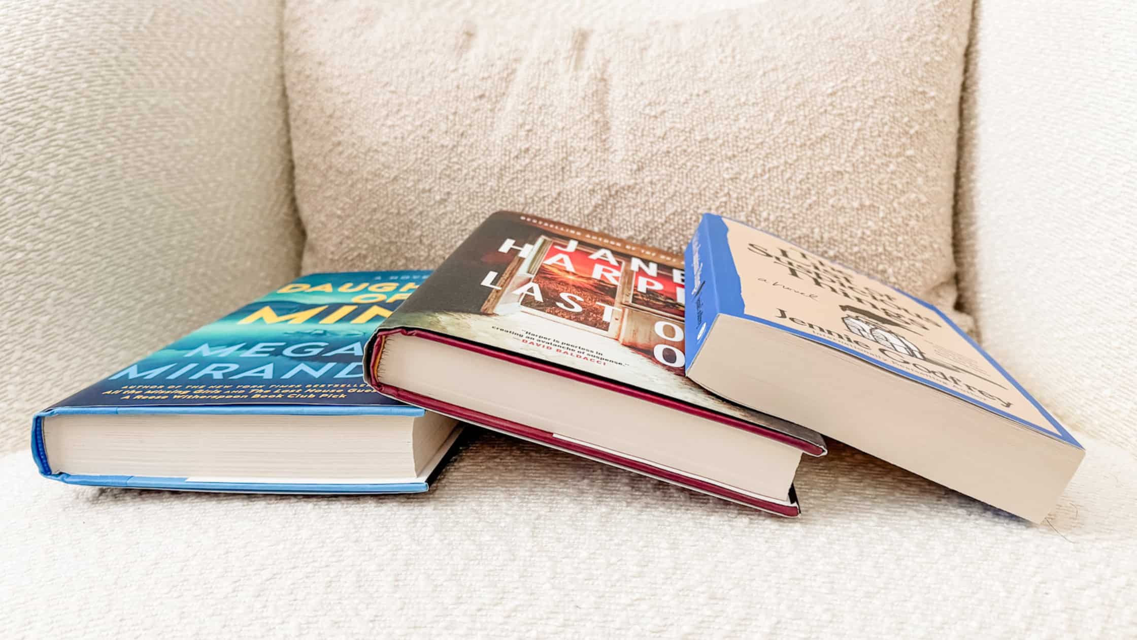 Flatlay of mystery books about small towns with big secrets