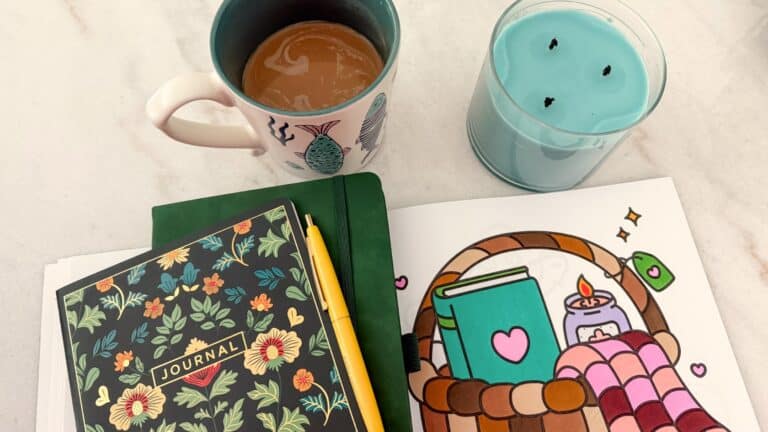 Cozy five-minute reset with coffee, coloring page, candles, and journaling